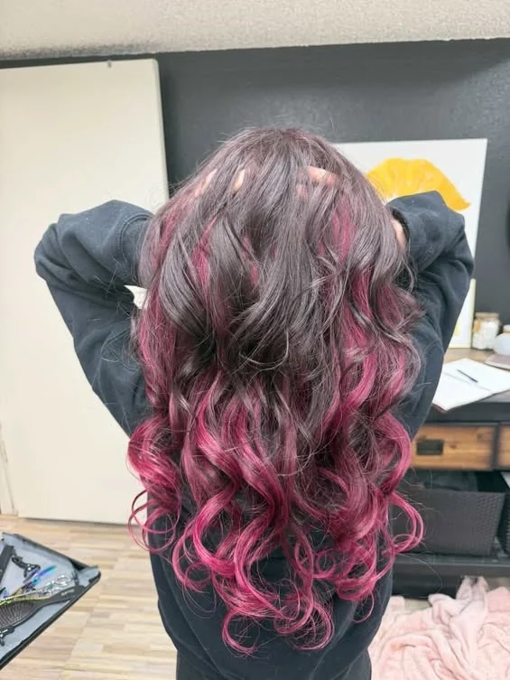 Rose-toned curls styled at Salon6Esthetics
