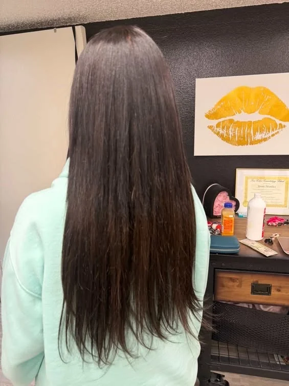 Long, smooth dark hair from the salon portfolio