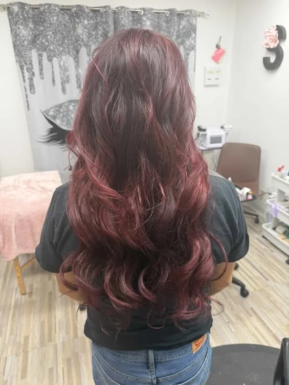Warm brunette curls from Salon6Esthetics