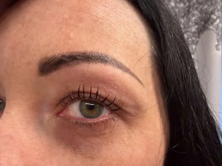 Defined brow and lash detail